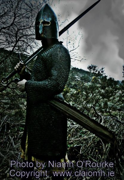 Lough Henny galloglaigh warrior of medieval Ireland carrying a claymore (extra long sword). Lough Henny galloglaigh warrior of medieval Ireland carrying a claymore (extra long sword).