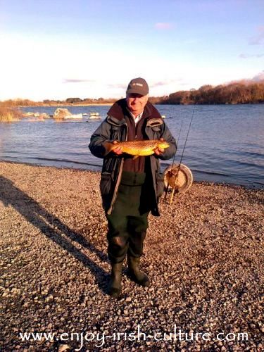 Kevin with a golden brown trout from Lough Corrib, County Galway, Ireland.