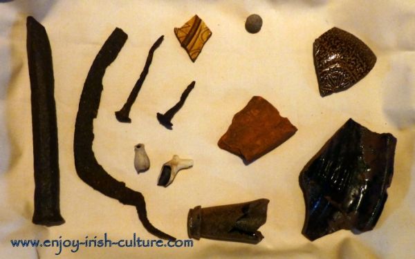 Artifacts found in the archaeological dig at Annaghdown Castle, County Galway, Ireland.