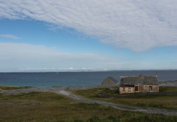 Aran Islands, Inisheer, landscape with old cottage.