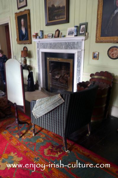 The fireplace in the drawing room at Strokestown Park House, County Roscommon, Ireland- the place for the ladies to gather after an elaborate dinner.