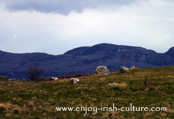Monument with a view of the Ox Mountains in the background. County Sligo, Ireland, is one the best places to visit if you want to meet ancient Ireland.