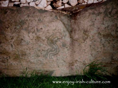 Kerb stone around the perimeter of the tomb at Newgrange, Ireland.