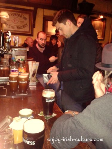 Buying a round in an Irish pub.