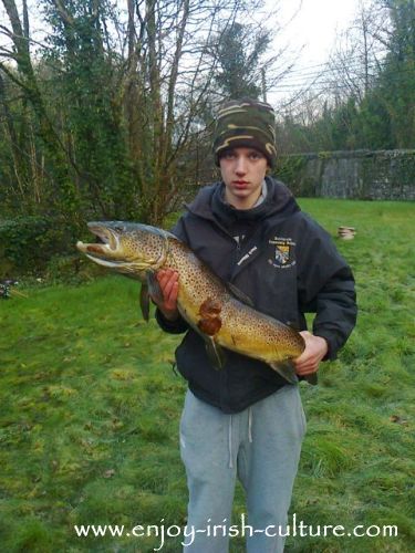 Fishing in Ireland- Peter with a male brown trout from Lough Corrib, County Galway, Ireland.