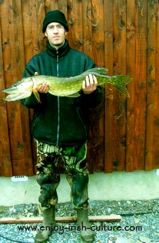 Colm with a great catch of pike.