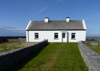 The Inishmore cottage of Peter Conneelly, dry stone builder who died at the age of 106 in 2011. This photo shows the house that he built himself where he raised his family of nine daughters.