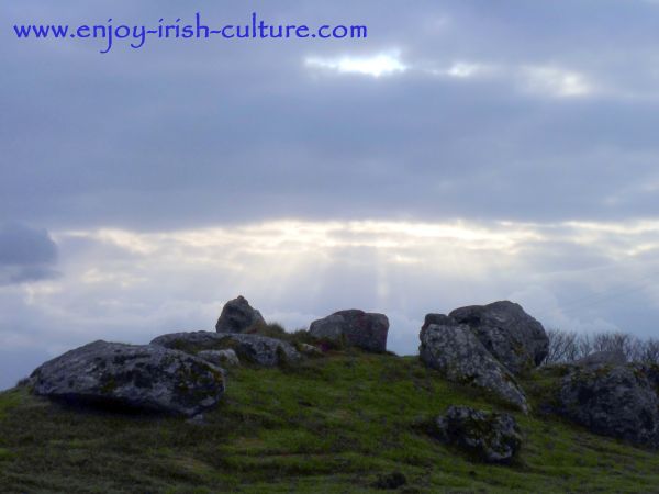 Illuminated rocks at he ancient site of Carrowmore, County Sligo, Ireland.