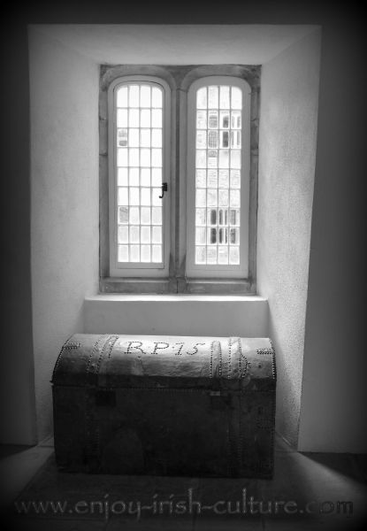 Chest and Renaissance window at the Ormond Castle at Carrick on Suir, Tipperary, Ireland.