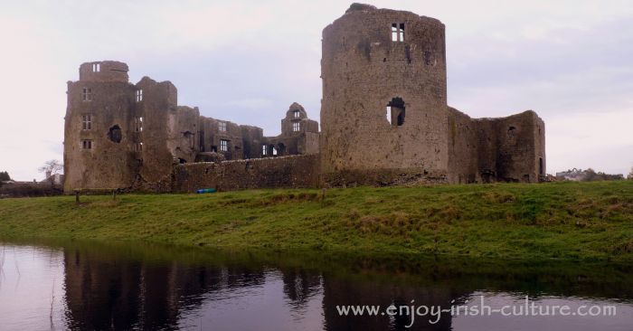 Roscommon Castle, Ireland, and a deep dip in the neighbouring field that would have been the moat in medieval times.