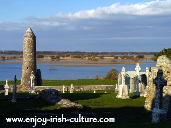 Clonmacnoise, McCarthy's tower and the river Shannon, County Offaly, Ireland.