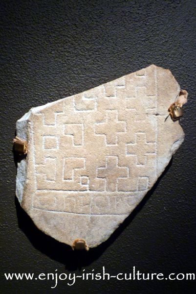 Remnants of a grave marker stone found at Clonmacnoise, County Offaly, and displayed in the museum there. Clonmacnoise was the most important medieval Irish monastery.