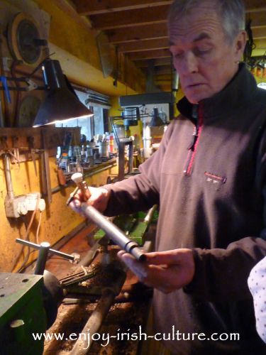 Eugene Lambe making a chanter for a set of uilleann pipes.