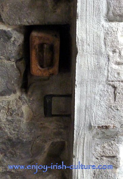 Beam used to secure the entrance door at Claregalway Castle, County Galway, Ireland.