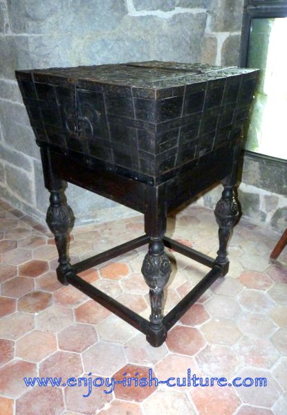 14th century tithe box, retrofitted with legs, on show at Claregalway Castle, County Galway, Ireland.