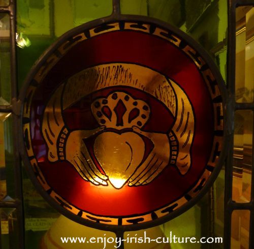 The Claddagh symbol in stained glass at Dillon's Jewellers Shop on Quay Street, Galway, Ireland, who are the oldest makers of the ring anywhere.