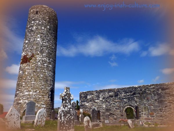 Church and round tower at Aghagower, County Mayo, Ireland.