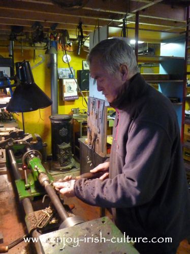 Well known uilleann piper and instrument maker Eugene Lambe in his workshop in Kinvara, County Galay, Ireland.