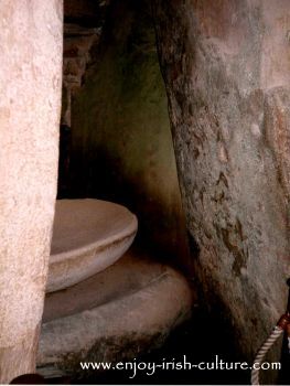 Basin in a side chamber at ancient Ireland's Newgrange megalithic tomb in County Meath, Ireland.