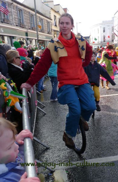St Paddy's Day Parade Galway 2013, unicyclist taking a break