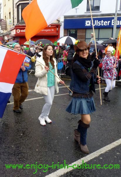 St Paddy's Day Parade Galway 2013, dancers with multinational flags