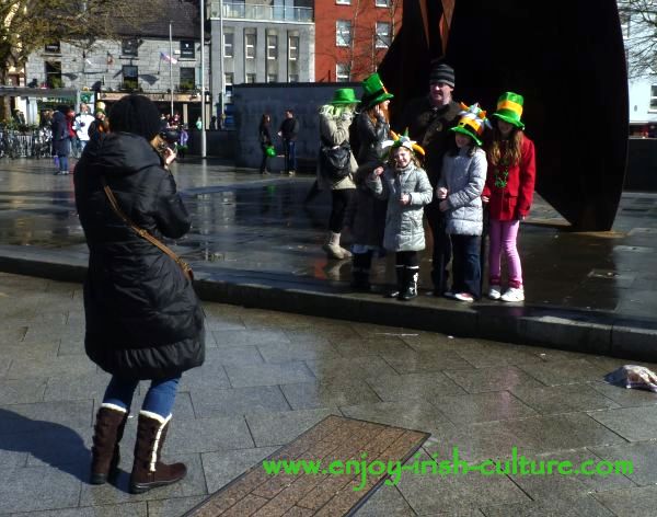 St Paddy's Day Parade Galway 2013, family taking a group picture